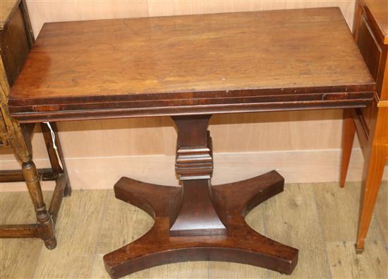 A Victorian mahogany folding tea table W.90cm